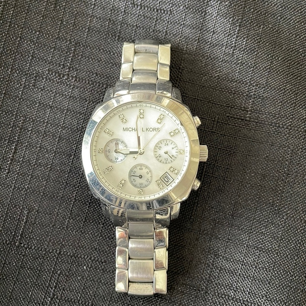 Michael Kors stainless steel watch.